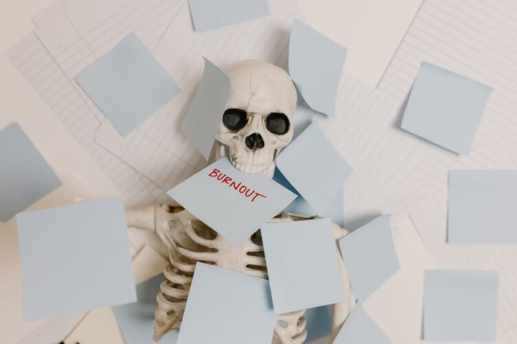 a skeleton buried with sticky notes